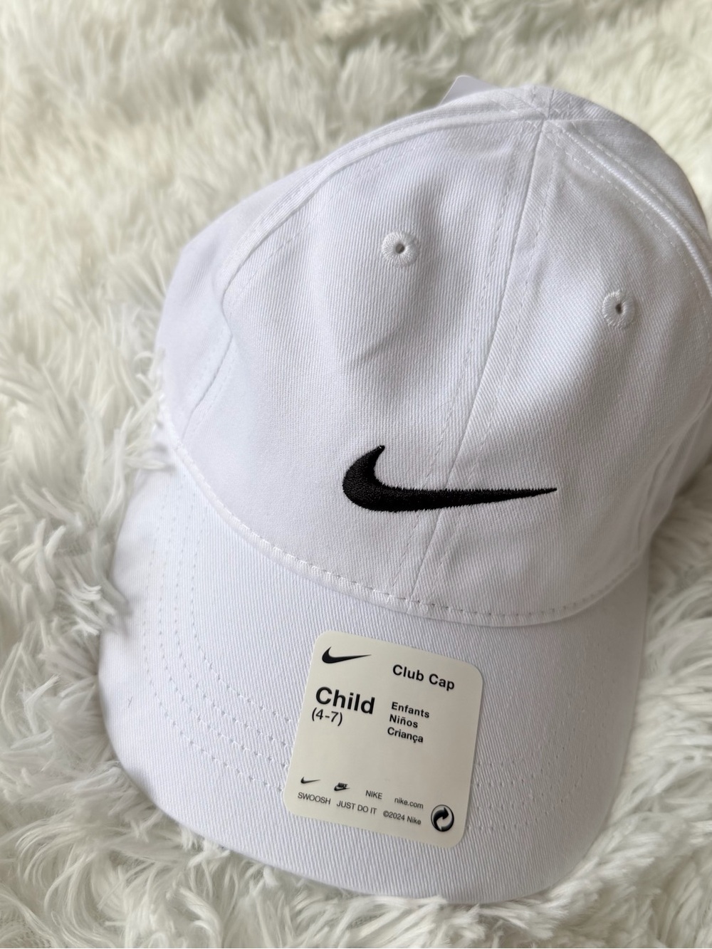 Nike White Kids Baseball Cap with Black Swoosh